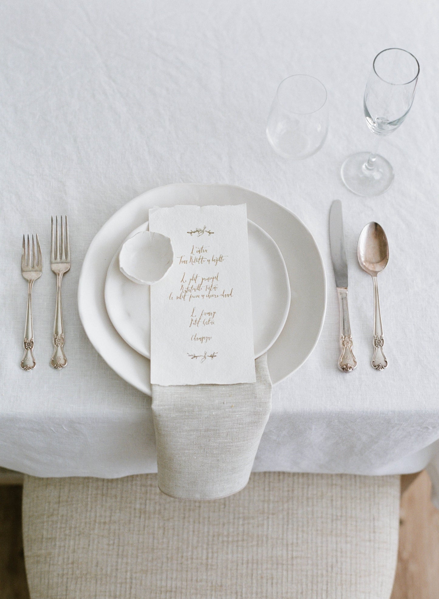 tagliaferro ceramics white matte ceramic table setting at wedding venue
