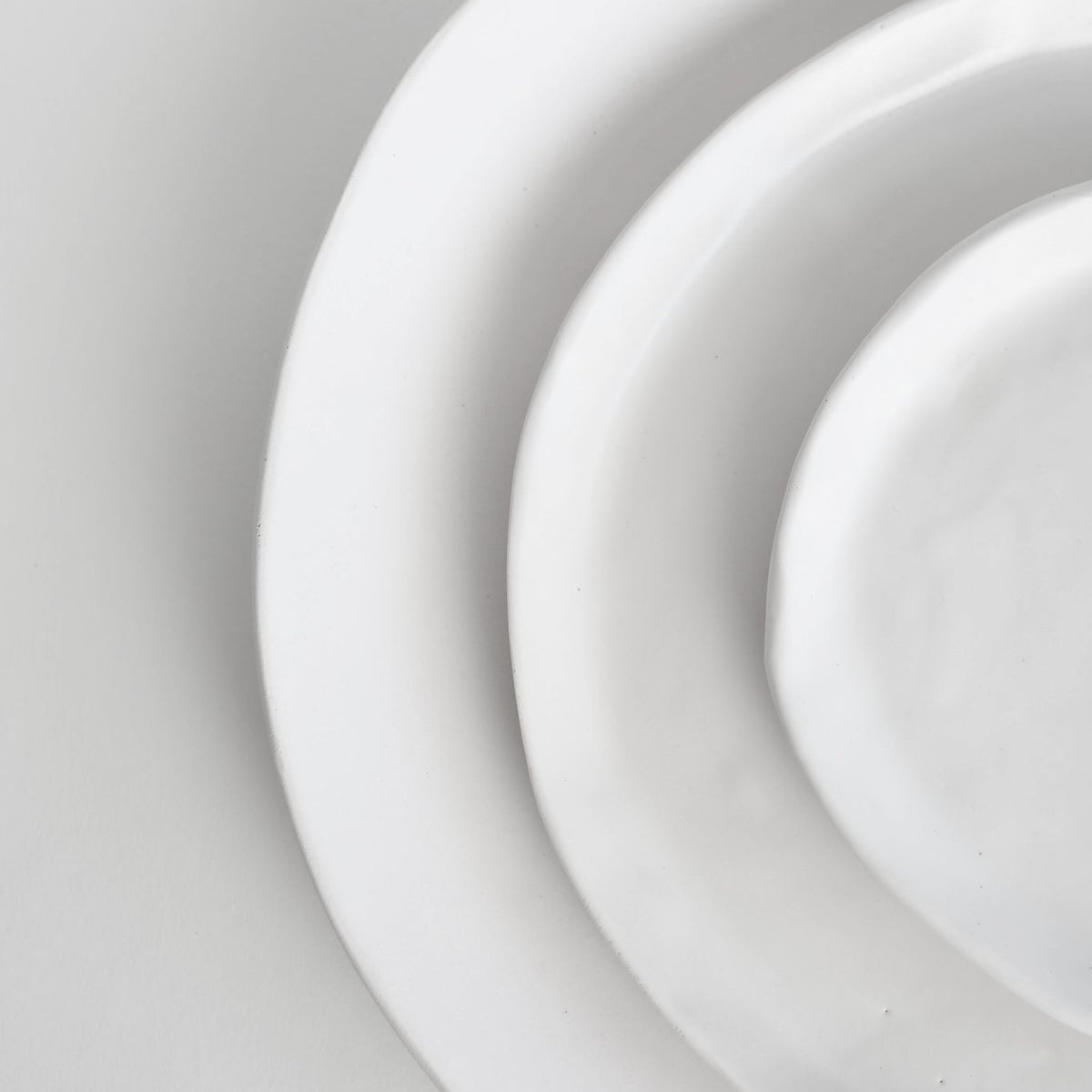 handmade white matte charger plate, Tagliaferro Ceramics