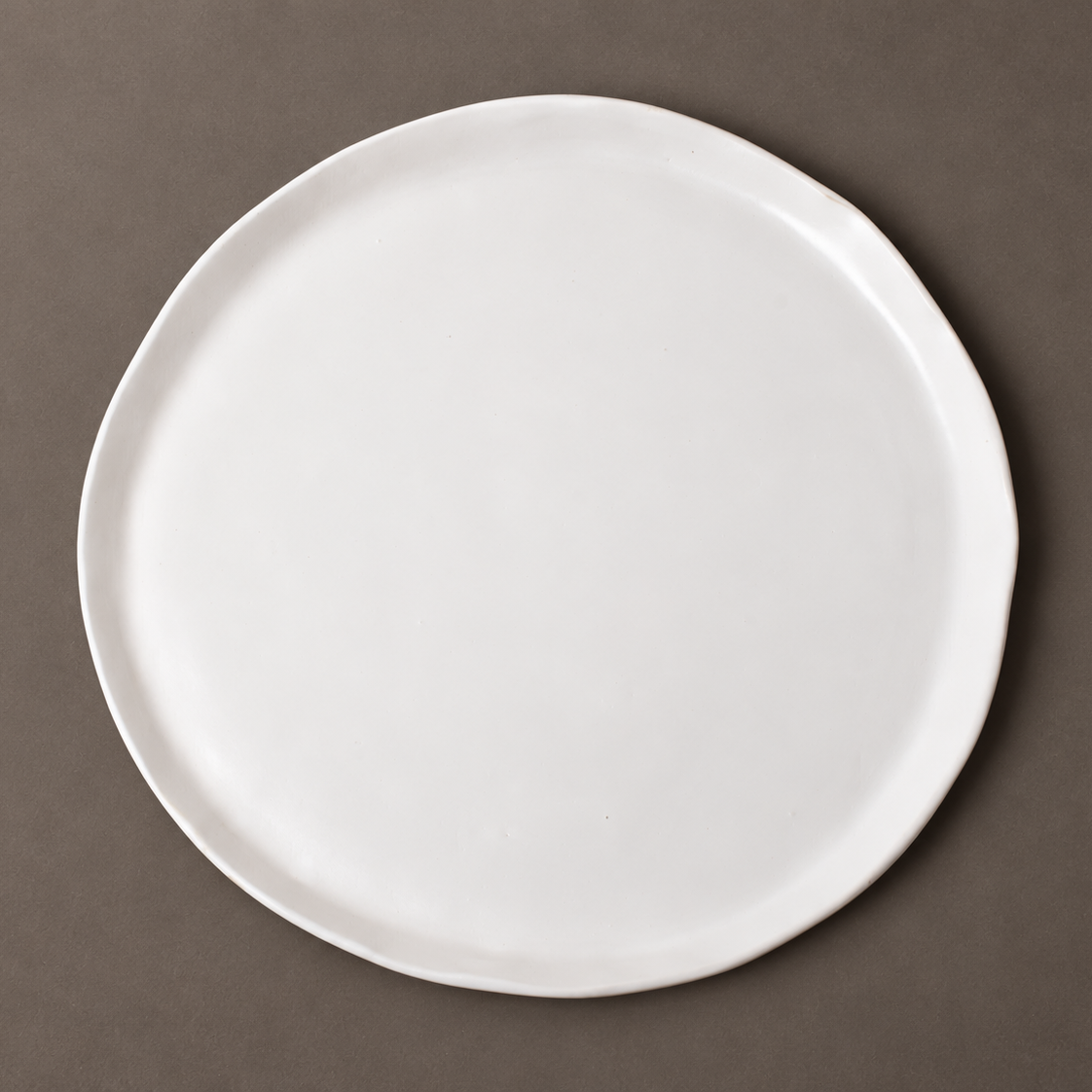 Handmade white matte charger plate, Tagliaferro Ceramics